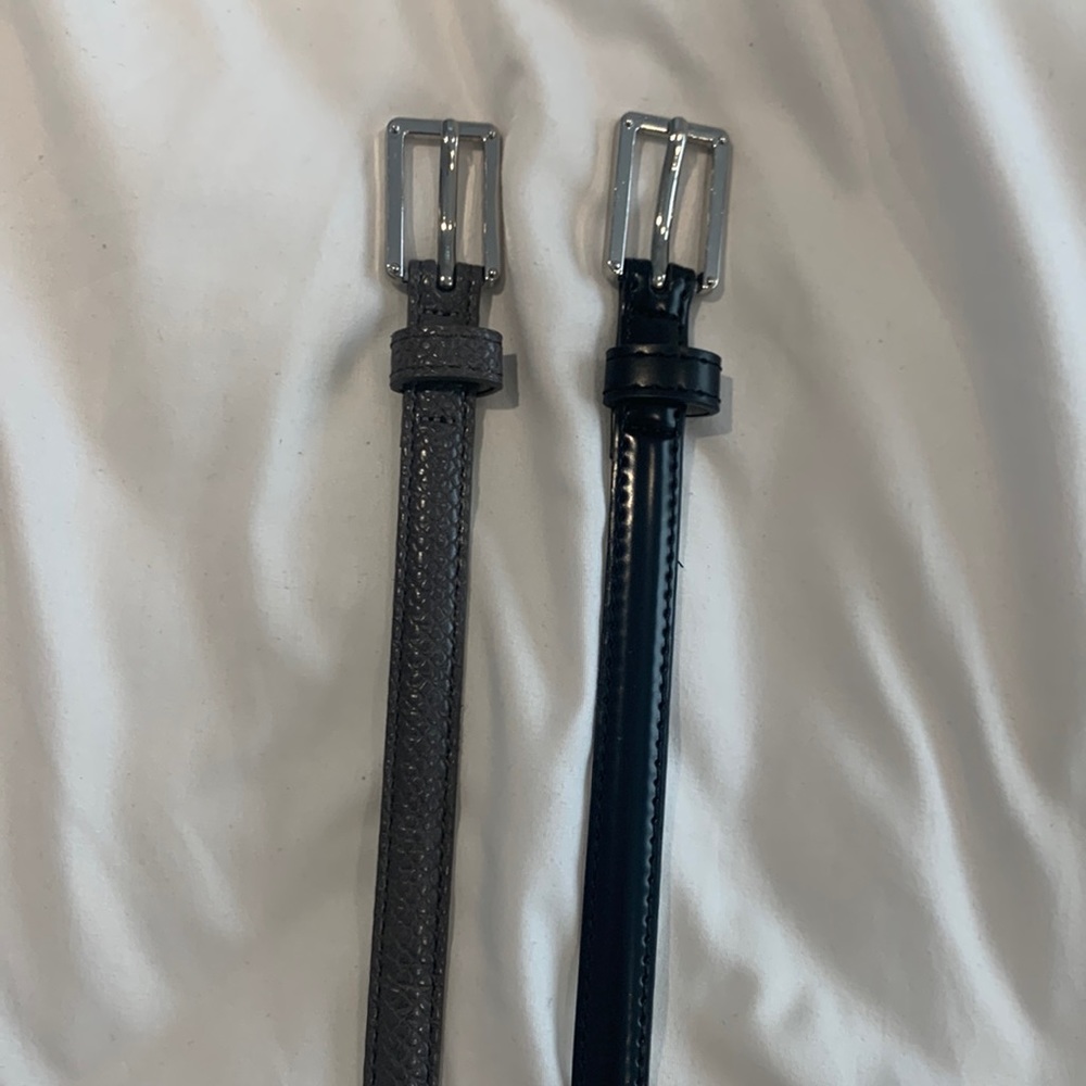 Pack of 2 skinny belts - one gray and one black - fits waist size 4